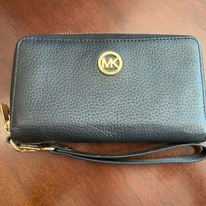 Michael Kors black and gold wristlet wallet
